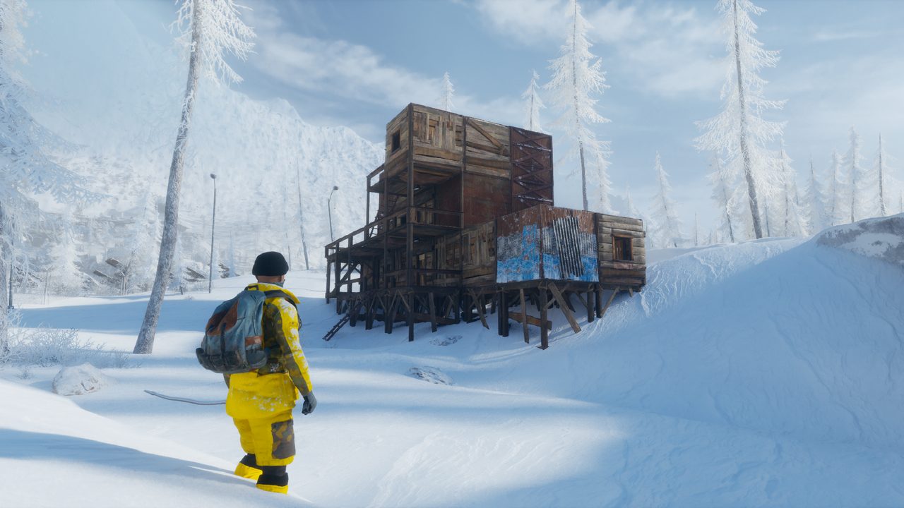 A player in a yellow jacket crossing a snow-covered Permafrost valley